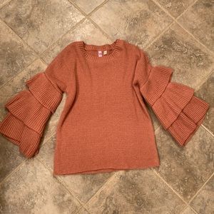 Francesca’s peach knit sweater with ruffle sleeves